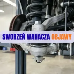 Zbliżenie na sworzeń wahacza samochodu w warsztacie.