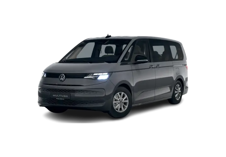 Szary Volkswagen Multivan T7 z włączonymi światłami, gotowy na podróż.